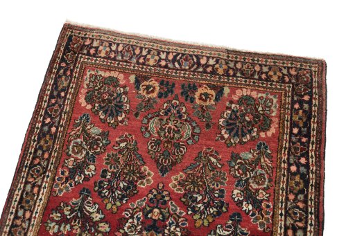 Surface texture of 1950s Sarough rug with natural Wool and intricate pattern
