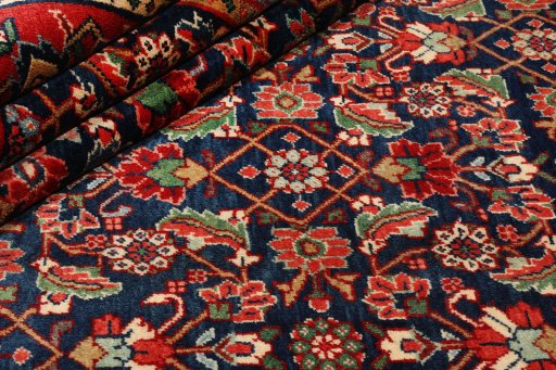 Corner detail of 1950s Sarough rug showing border pattern and Wool pile