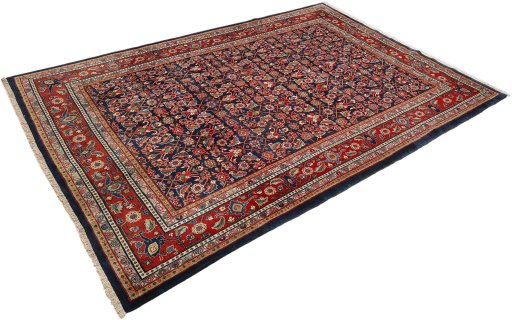 Corner detail of 1950s Sarough rug showing border pattern and Wool pile