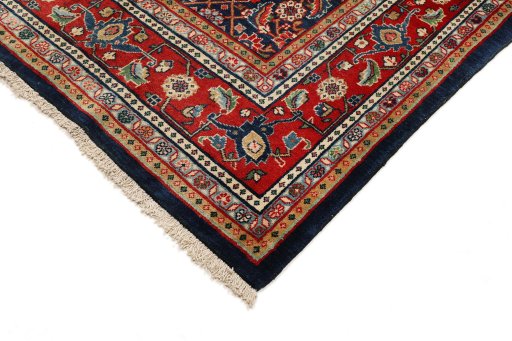 Backside of handmade 1950s Sarough rug showing knot structure and weave density