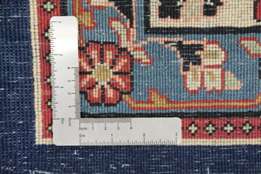 Full view of 1950s Sarough rug from Iran / Persia, 370 × 280 cm in Dark blue tones