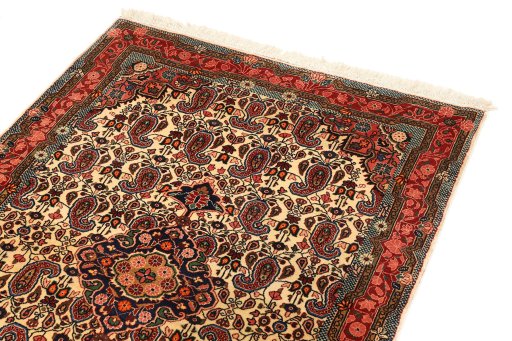 Backside of handmade 1930s Sarough rug showing knot structure and weave density