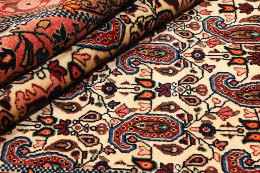 Close-up detail of 1930s Sarough rug from Iran / Persia showing Wool weave