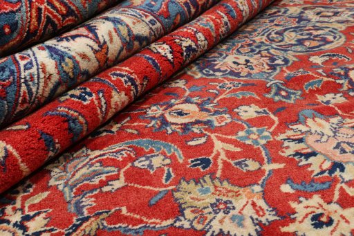 Backside of handmade 1960s Sarough rug showing knot structure and weave density