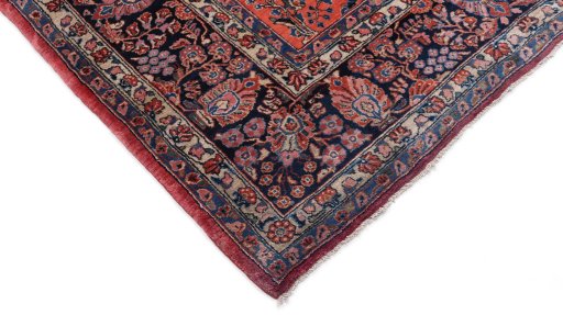 Backside of handmade 1910s Sarough rug showing knot structure and weave density