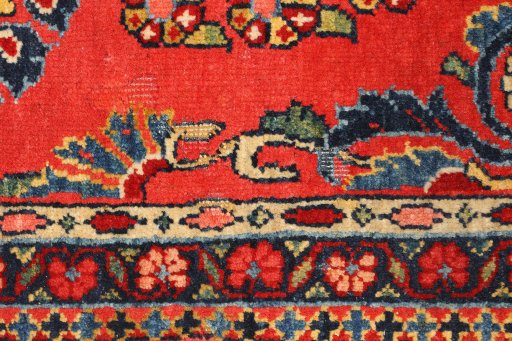 Surface texture of 1920s Sarough rug with natural Wool and intricate pattern
