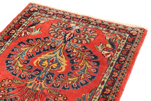 Backside of handmade 1920s Sarough rug showing knot structure and weave density