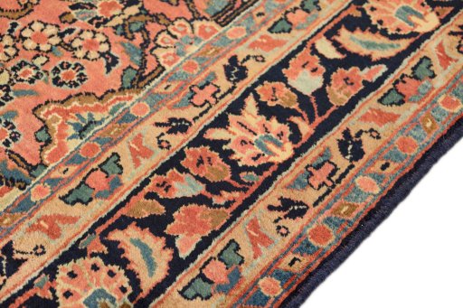 Backside of handmade 1930s Sarough rug showing knot structure and weave density