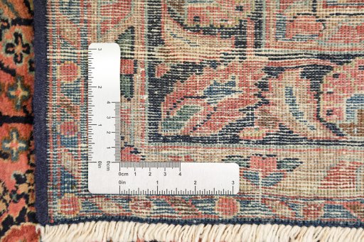 Close-up detail of 1930s Sarough rug from Iran / Persia showing Wool weave