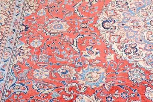 Corner detail of 2000s Sarough rug showing border pattern and Cork pile