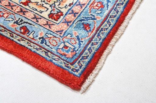 Surface texture of 2000s Sarough rug with natural Cork and intricate pattern