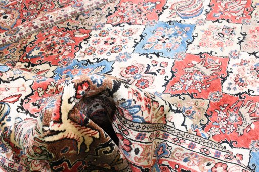 Close-up detail of 2000s Sarough rug from Iran / Persia showing Wool weave
