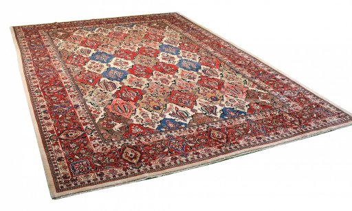 Corner detail of 2000s Sarough rug showing border pattern and Wool pile