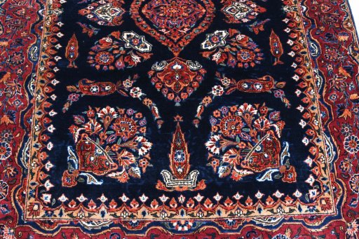 Backside of handmade 1930s Sarough rug showing knot structure and weave density
