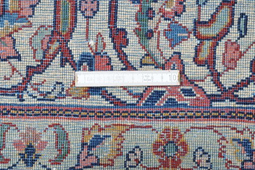 Corner detail of 2000s Sarough rug showing border pattern and Wool pile