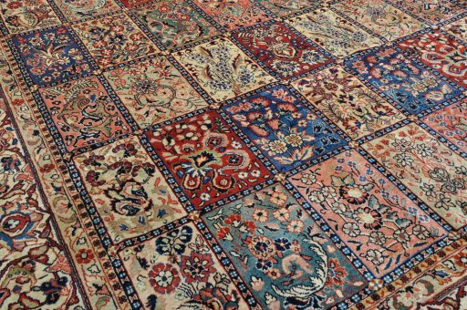 Surface texture of 2000s Sarough rug with natural Wool and intricate pattern