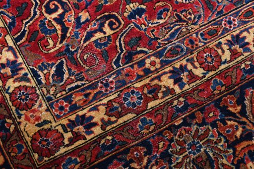 Corner detail of 1930s Sarough rug showing border pattern and Cork pile