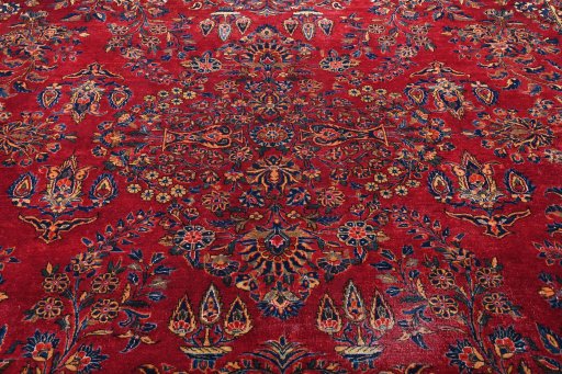 Surface texture of 1930s Sarough rug with natural Cork and intricate pattern