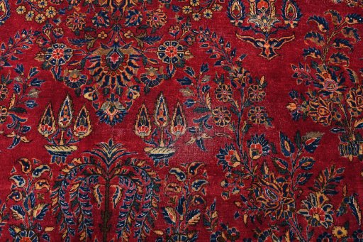 Backside of handmade 1930s Sarough rug showing knot structure and weave density