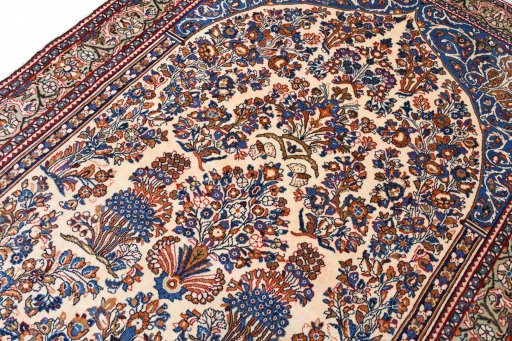 Close-up detail of 2000s Sarough rug from Iran / Persia showing Wool weave