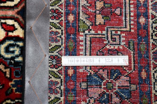 Corner detail of 2000s Sarough rug showing border pattern and Wool pile