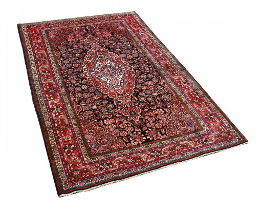 Corner detail of 2000s Sarough rug showing border pattern and Wool pile