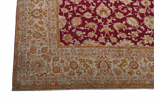 Backside of handmade 1950s Sarough rug showing knot structure and weave density