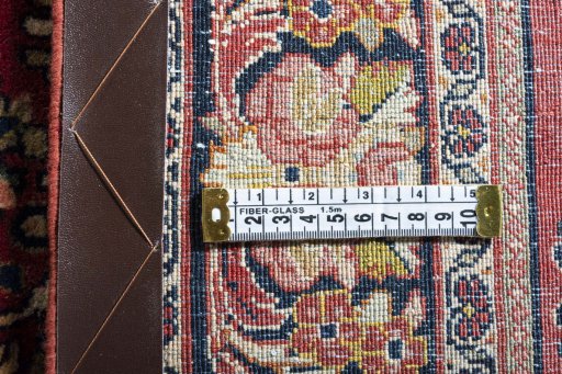 Surface texture of 1970s Sarough rug with natural Wool and intricate pattern