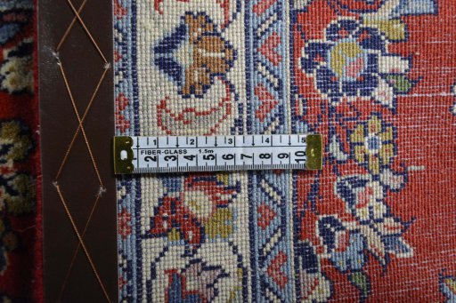Backside of handmade New Sarough rug showing knot structure and weave density