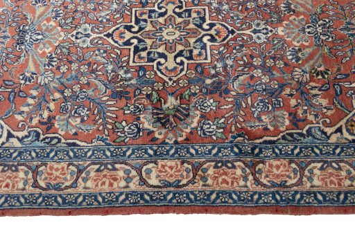 Corner detail of 2000s Sarough rug showing border pattern and Cork pile