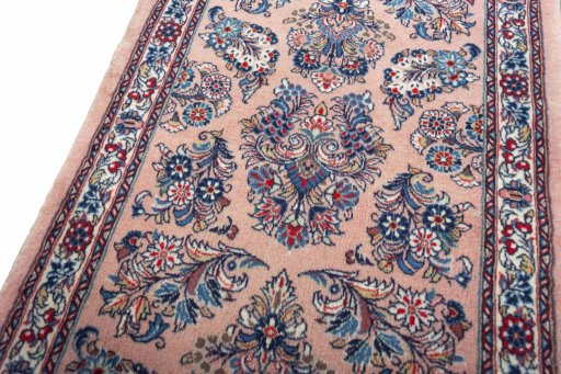 Backside of handmade New Sarough rug showing knot structure and weave density