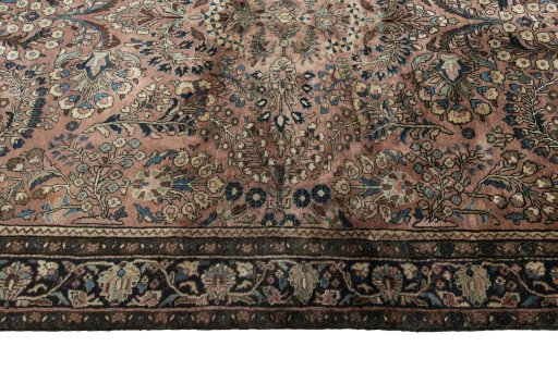 Corner detail of 1930s Sarough rug showing border pattern and Wool pile