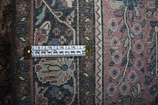 Backside of handmade 1930s Sarough rug showing knot structure and weave density