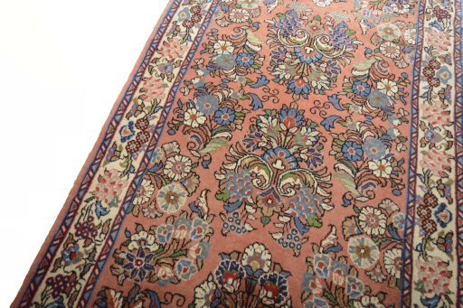 Backside of handmade New Sarough rug showing knot structure and weave density