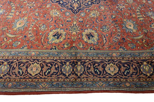 Corner detail of 2000s Sarough rug showing border pattern and Wool pile