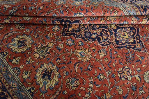 Close-up detail of 2000s Sarough rug from Iran / Persia showing Wool weave