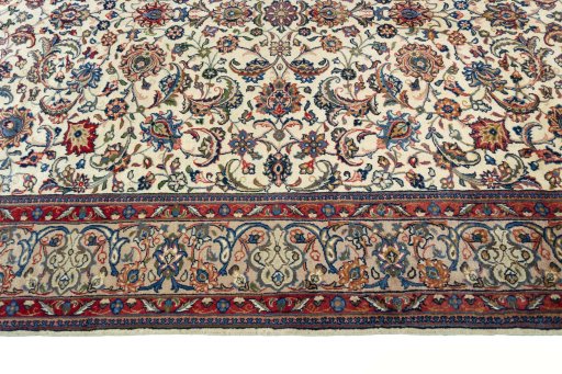 Corner detail of 2000s Sarough rug showing border pattern and Wool pile