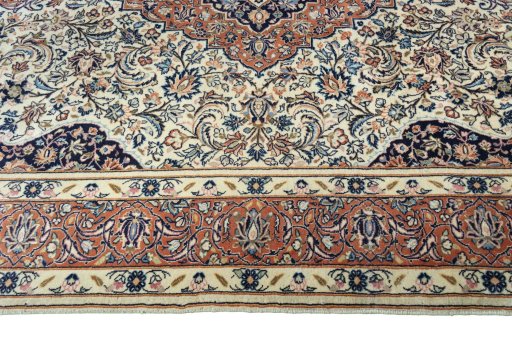 Corner detail of New Sarough rug showing border pattern and Wool pile