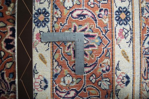 Backside of handmade New Sarough rug showing knot structure and weave density
