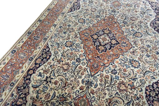 Backside of handmade New Sarough rug showing knot structure and weave density