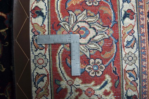 Backside of handmade New Sarough rug showing knot structure and weave density