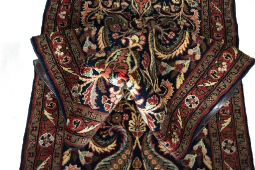 Corner detail of New Sarough rug showing border pattern and Wool pile