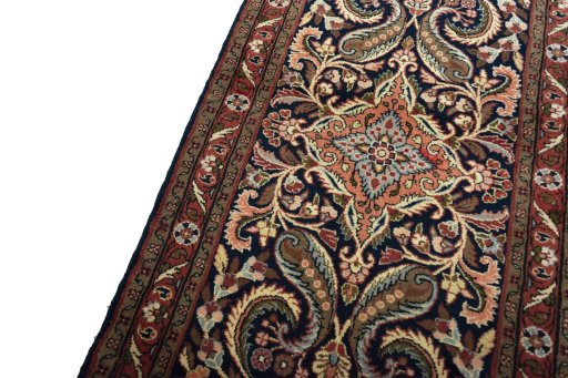 Backside of handmade New Sarough rug showing knot structure and weave density