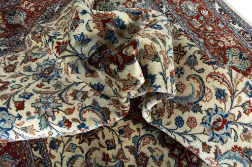 Surface texture of 2000s Sarough rug with natural Wool and intricate pattern