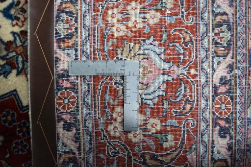 Backside of handmade 2000s Sarough rug showing knot structure and weave density