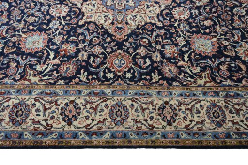 Corner detail of 2000s Sarough rug showing border pattern and Wool pile