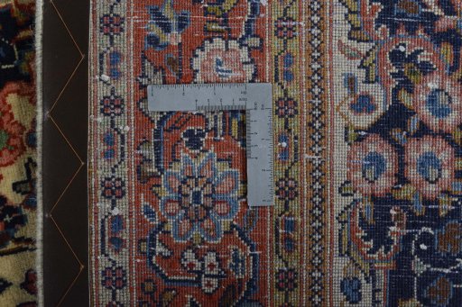 Backside of handmade New Sarough rug showing knot structure and weave density