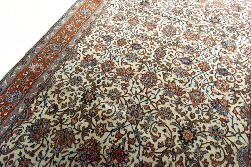 Backside of handmade New Sarough rug showing knot structure and weave density