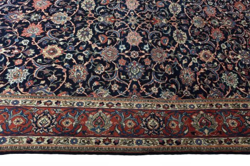 Corner detail of 1970s Sarough rug showing border pattern and Wool pile