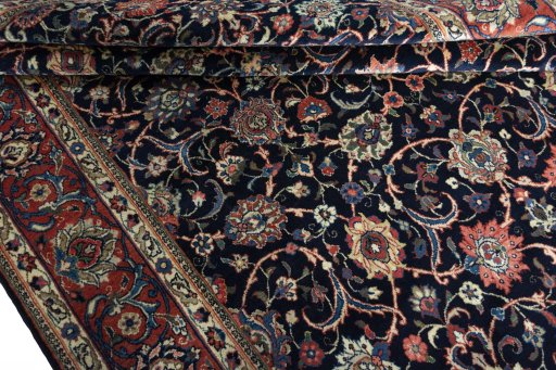 Close-up detail of 1970s Sarough rug from Iran / Persia showing Wool weave